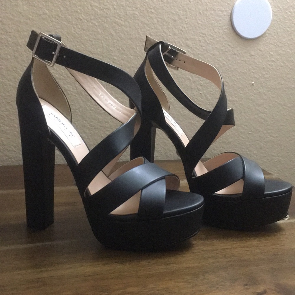 Brand new Black Platform heels.